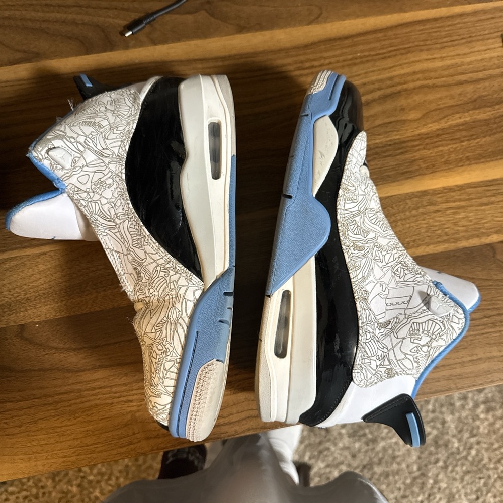 Stylish White and Blue Sneakers with Black Accents